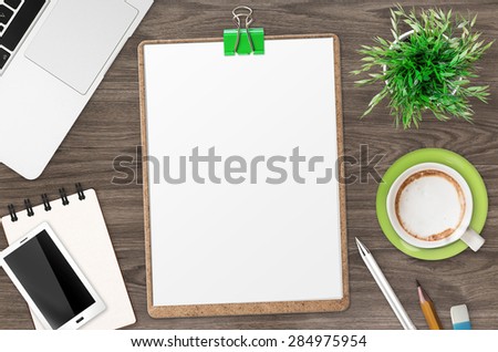 blank clipboard on office desk top view