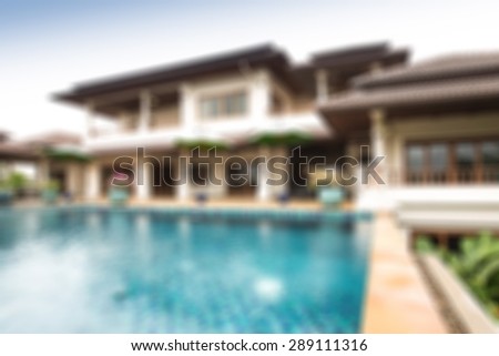 luxury house with pool blurred background
