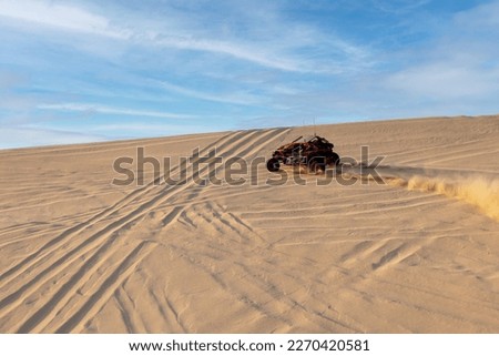 Similar – Jumping in Sand Dunes