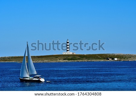 View of the island of Aire beach Punta Prima island of Menorca Foto d'archivio © 