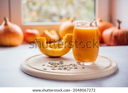 Similar – Image, Stock Photo Fresh pumpkin juice