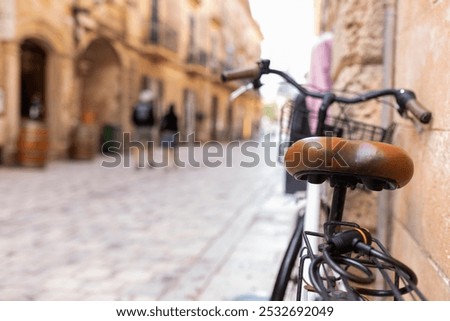 Similar – Image, Stock Photo Old bicycle saddle with visible springs and rust