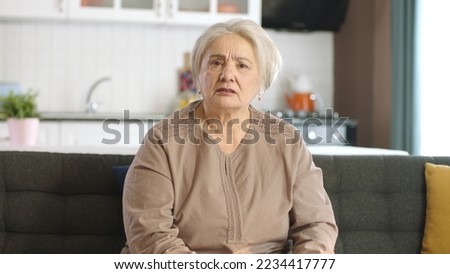 Similar – Image, Stock Photo Woman sitting in her bed with Christmas fairy lights