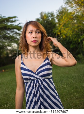 Woman afraid of something in the park