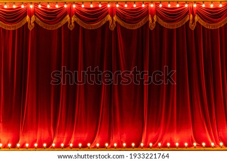 Theater red curtain and neon lamp around border