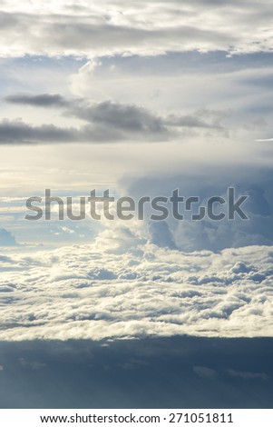 clouds sky. view from the window of an airplane flying in the clouds, top view clouds like an ocean