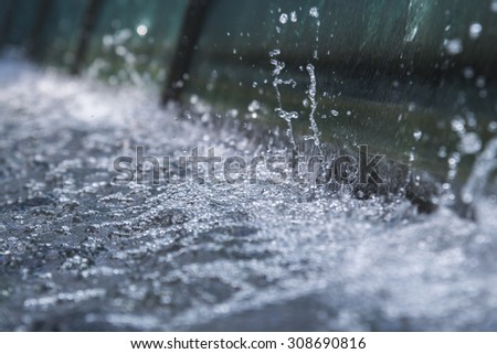 close up waterdrop, Water ventilation outside building/tower with water Flow-through glass
