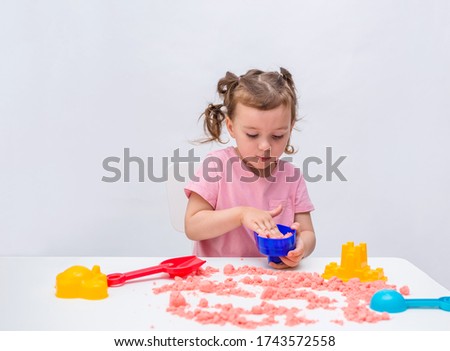 Similar – Image, Stock Photo Little blonde girl playing and holding her young parents hand.