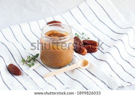Date paste healthy substitute for white sugar. Sugar and refined sugar free. Selective focus. Healthy food background.