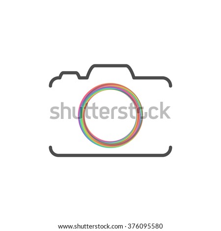 Photo camera silhouette with colorful circle