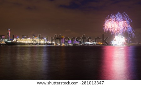 Liverpool, UK - May 24: Queen Mary 2 docks Liverpool and celebrates Cunard\'s 175th anniversary on May 24, 2015. Queen Mary 2 is Cunard\'s flagship ocean line which has a capacity of 2,620 passengers.