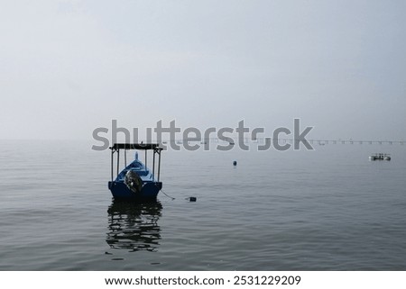 Similar – Image, Stock Photo Boat floating in calm sea water