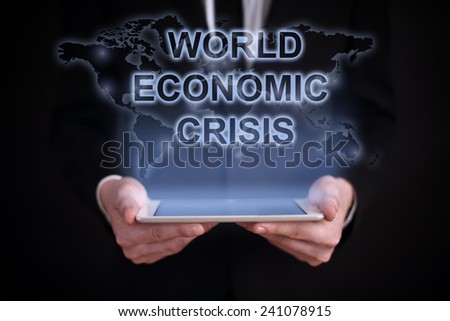 businessman holding a tablet PC with the projection map of the world on the screen. WORLD ECONOMIC CRISIS. global recruitment. job search.