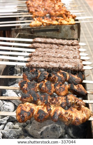 An Arab-Style Barbecue With Chicken Kebabs, Kofta And Chicken Legs ...