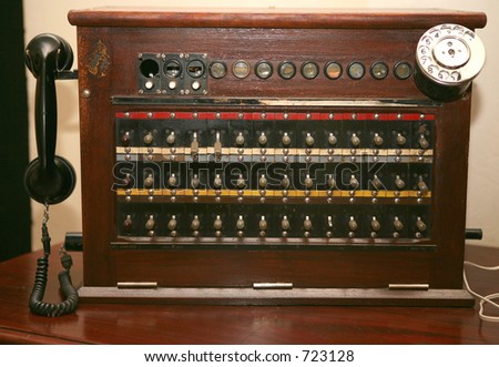 An antique telephone switchboard of the kind used in hotels and companies in the mid-20th century.