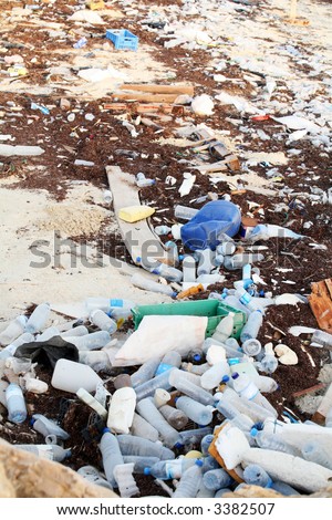 Rubbish washed up on the shore in the Arabian Gulf. Mineral water bottles, shampoo bottles and old tins are among the hazards facing marine wildlife despite regulations controlling dumping.