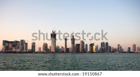 Doha skyline seen from the bay at sunset, during the construction of the West Bay commercial district, February 29, 2009
