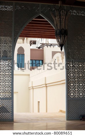 A traditionally arched Arabian doorway and architecture in Doha, Qatar