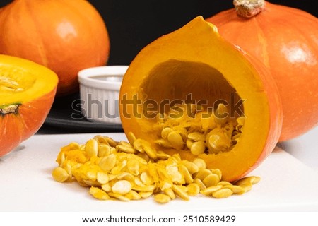 Similar – Image, Stock Photo Hokkaido pumpkin in red in a round basket on old cobblestones in the Hanseatic town of Lemgo near Detmold in East Westphalia-Lippe