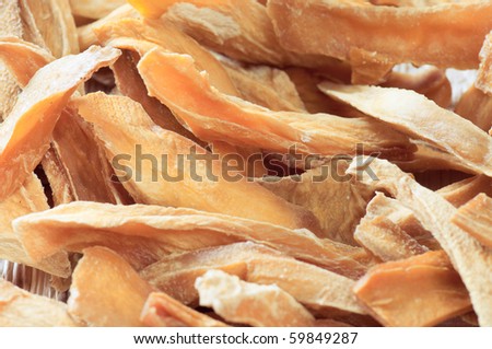 Closeup of dried sliced mango. Ecological food. Viewpoint from above.