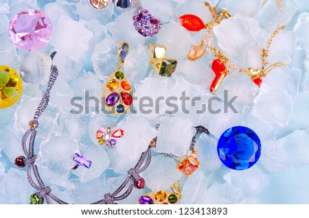 Jewels at blue cube of ice