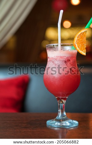 berry milkshake with orange fruit