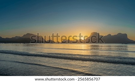 Similar – Image, Stock Photo The sun disappears behind the trees. Behind the house it is already dark. A strong cloud cover gives the whole a magnificent panorama.