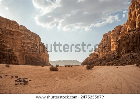 Similar – Image, Stock Photo Rocky cliff on sandy seacoast under sundown sky in Spain