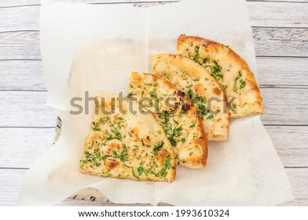 Similar – Foto Bild Portionen von leckerem Naan-Brot mit Lachs auf Tellern