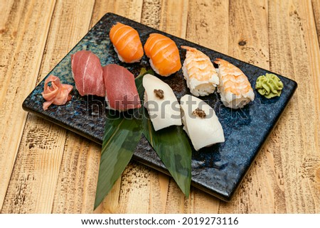 Similar – Image, Stock Photo Norwegian nigiri with salmon and wasabi