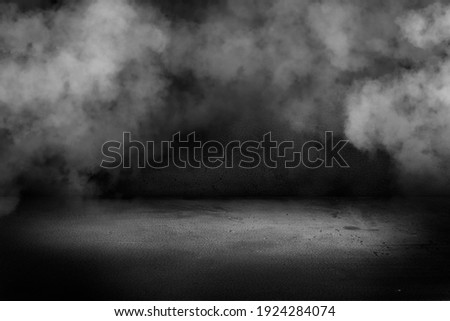 Texture dark concentrate floor with mist or fog. Black, dark and gray abstract cement wall and studio room , interior texture for display products