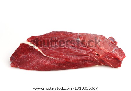 Fillet of beef isolated on white background. The shoulder blade is one of the most tender parts of beef. Healthy food concept.