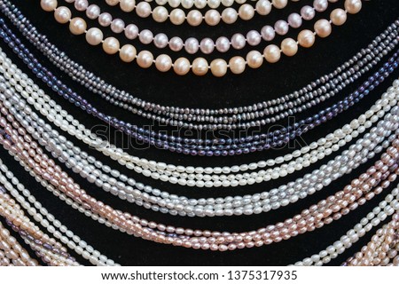 Pearl necklace. Lady accessories made from biser pearl. texture and pattern of beautiful pearl necklace for background. Imagine de stoc © 