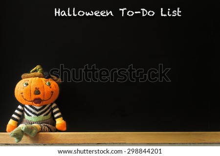 Pumpkin Plush Doll with Chalk Black Board, for Halloween Background, Wallpaper