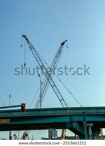 Image, Stock Photo Two cranes crossed