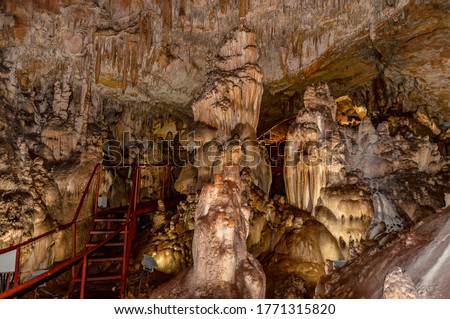 Little known cave Dobrostanski biser - Bulgaria. Rock cave formations Imagine de stoc © 