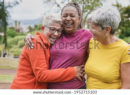 Similar – Image, Stock Photo Multi-ethnic group of friends with their heads together in a circle.