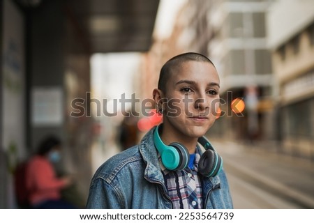 Similar – Image, Stock Photo Young woman waiting for subway train in New York City