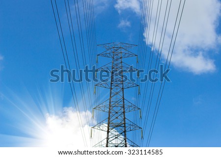 Electric Transmission Tower.electricity transmission pylon silhouetted against blue sky at dusk
