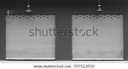 two black shop shutters.