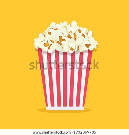 Popcorn isolated on yellowe background. Cinema icon in flat style. Snack food. Big red white strip box. Vector stock