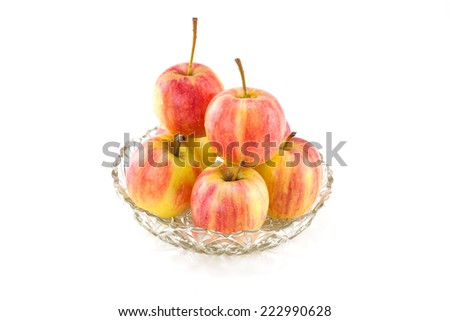 seven apple in cup