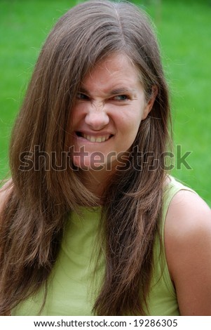 Girl with angry facial expression