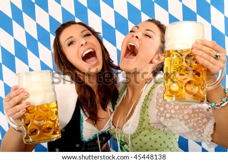 two happy girls with beer and wide open mouth