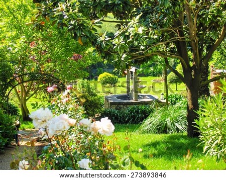 Spectacular garden with lots of color and a well. Asturias. Spain.