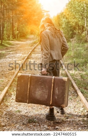 Similar – Image, Stock Photo Traveling woman walking along seashore