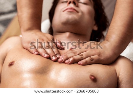 Similar – Image, Stock Photo Male therapist doing procedures with client in clinic