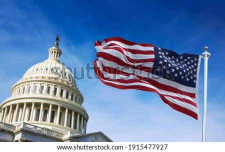 American flag waving with the US Capitol Hill in the background ストックフォト © 