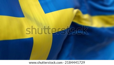 Close-up view of Sweden national flag waving in the wind. Scandinavian country located in northern Europe Foto stock © 