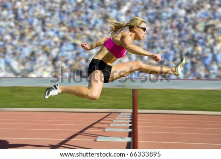 Female track and field athlete hurdling.